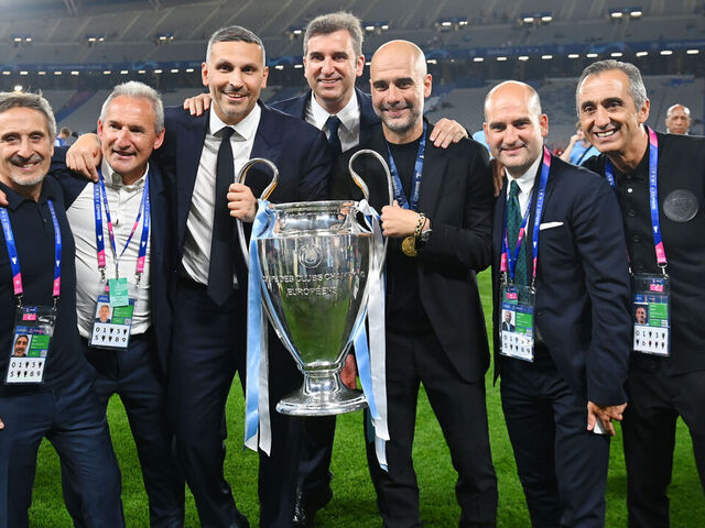 ISTANBUL, TURKEY - JUNE 10: City Football Group director of football Joan Patsy, Manchester City director of football Txiki Begiristain, Manchester City Chairman Khaldoon Al Mubarak, Manchester City CEO Ferran Soriano, Manchester City manager PepGuardiola, Pere Guardiola and Manchester City coach Manel Astiarte pose with the trophy after the UEFA Champions League 2022/23 final match between FC Internazionale and Manchester City FC at Ataturk Olympic Stadium on June 10, 2023 in Istanbul, Turkey.