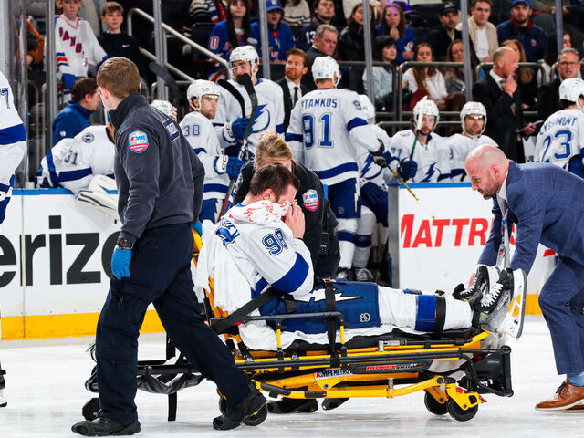 NEW YORK, NEW YORK - FEBRUARY 07: Mikhail Sergachev #98 of the Tampa Bay Lightning is stretchered off the ice by medical staff in the second period against the New York Rangers at Madison Square Garden on February 7, 2024 in New York City.