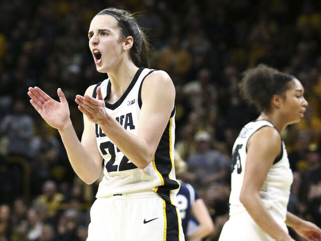 IOWA CITY, IOWA- FEBRUARY 8: Guard Caitlin Clark #22 of the Iowa Hawkeyes celebrates after a basket during the first half against the Penn State Nittany Lions at Carver-Hawkeye Arena on February 8, 2024 in Iowa City, Iowa.