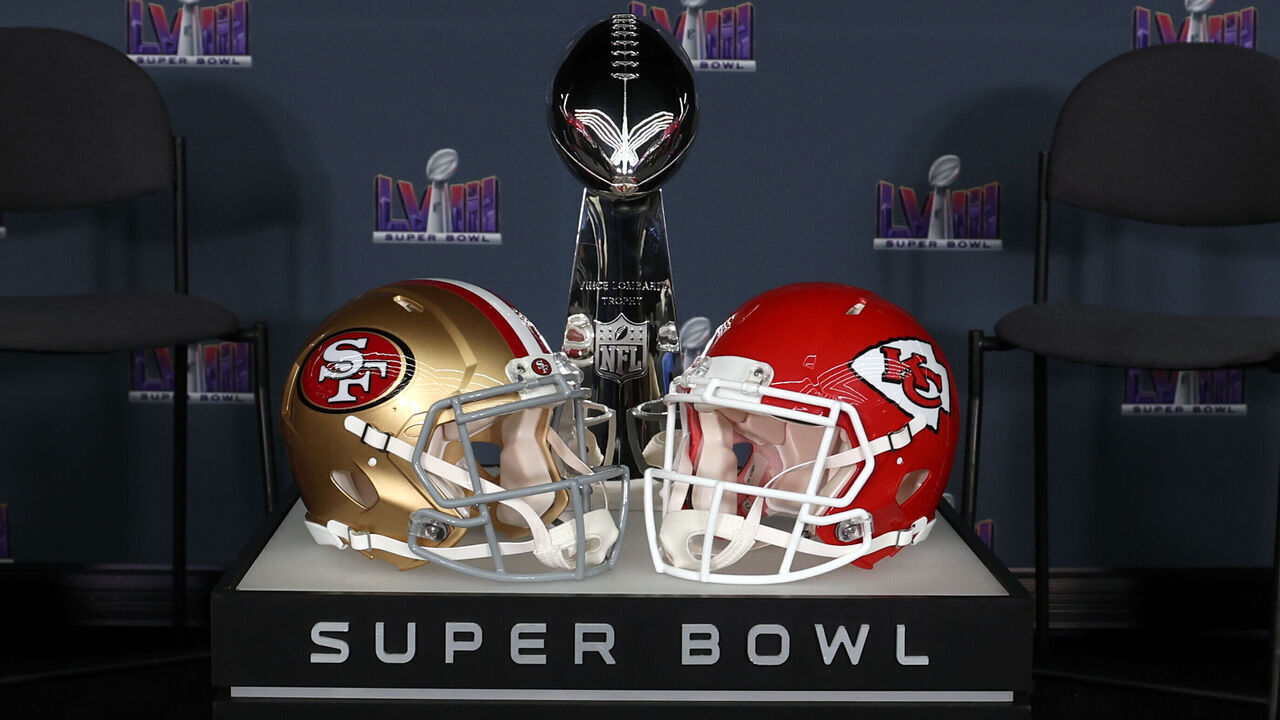 LAS VEGAS, NV - FEBRUARY 5: A general view of the Vince Lombardi Trophy with the San Francisco 49ers and Kansas City Chiefs helmets before a press conference ahead of Super Bowl LVIII at Allegiant Stadium on February 5, 2024 in Las Vegas, NV.