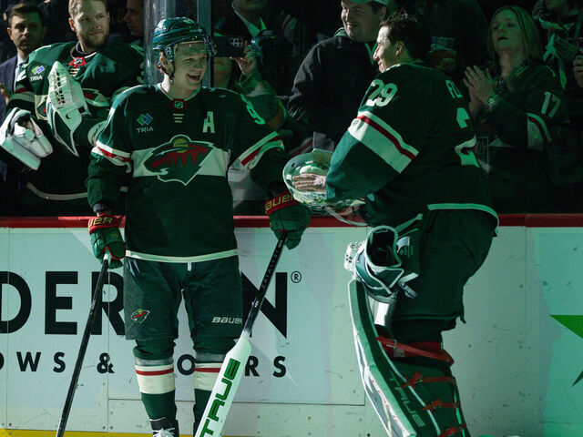 SAINT PAUL, MN - FEBRUARY 09: Minnesota Wild goaltender Marc-Andre Fleury (29) celebrates his 1000th game with left wing Kirill Kaprizov (97) before the NHL game between the Pittsburgh Penguins and the Minnesota Wild on February 9th, 2024, at the Xcel Energy Center in Saint Paul, MN.