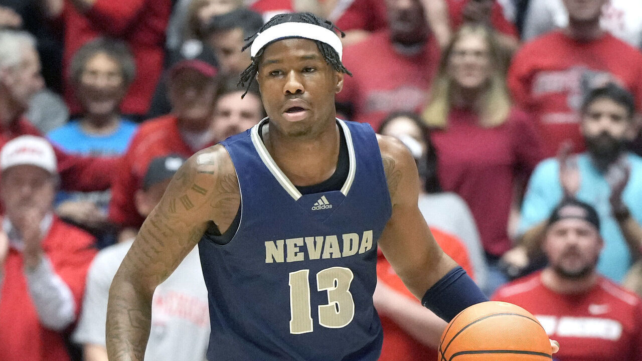ALBUQUERQUE, NM - JANUARY 28: Kenan Blackshear #13 of the Nevada Wolf Pack dribbles up court during a college basketball game against the New Mexico Lobos at The Pit on January 28, 2024 in Albuquerque, New Mexico.