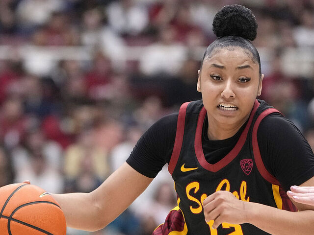 PALO ALTO, CALIFORNIA - FEBRUARY 02: JuJu Watkins #12 of the USC Trojans drives towards the basket against the Stanford Cardinal in the second quarter of an NCAA basketball game at Stanford Maples Pavilion on February 02, 2024 in Palo Alto, California.