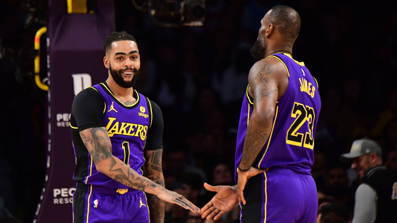 LOS ANGELES, CA - FEBRUARY 9: D'Angelo Russell #1 and LeBron James #23 of the Los Angeles Lakers react during the game against the New Orleans Pelicans on February 9, 2024 at Crypto.Com Arena in Los Angeles, California. NOTE TO USER: User expressly acknowledges and agrees that, by downloading and/or using this Photograph, user is consenting to the terms and conditions of the Getty Images License Agreement. Mandatory Copyright Notice: Copyright 2024 NBAE