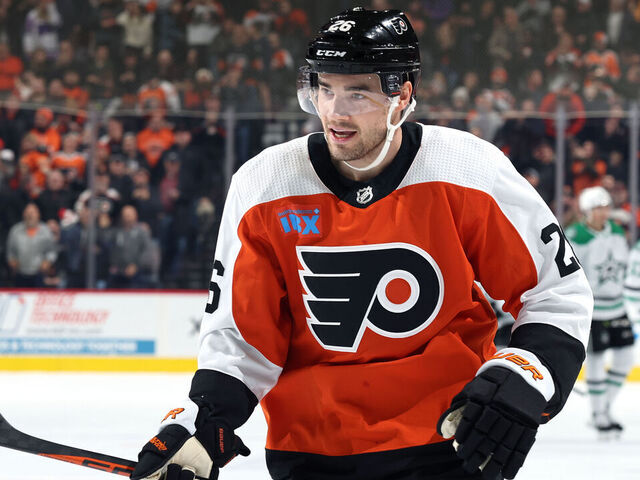 PHILADELPHIA, PENNSYLVANIA - JANUARY 18: Sean Walker #26 of the Philadelphia Flyers looks on after scoring during the first period against the Dallas Stars at the Wells Fargo Center on January 18, 2024 in Philadelphia, Pennsylvania.