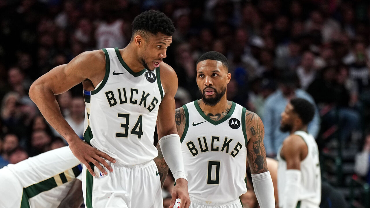 DALLAS, TX - FEBRUARY 3: Giannis Antetokounmpo #34 of the Milwaukee Bucks and Damian Lillard #0 of the Milwaukee Bucks talk during the game against the Dallas Mavericks on February 3, 2024 at the American Airlines Center in Dallas, Texas. Mandatory Copyright Notice: Copyright 2024 NBAE