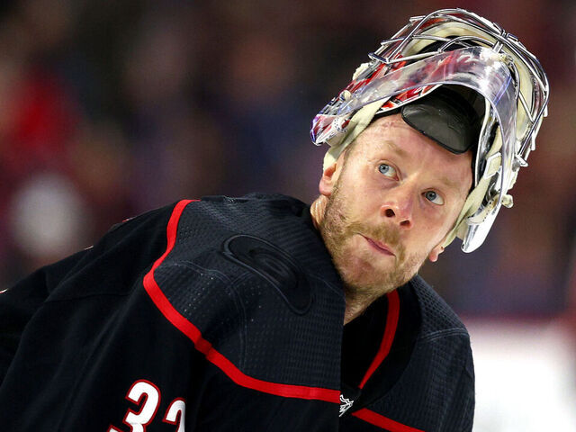 RALEIGH, NORTH CAROLINA - JANUARY 25: Antti Raanta #32 of the Carolina Hurricanes looks on during the third period of the game against the New Jersey Devils at PNC Arena on January 25, 2024 in Raleigh, North Carolina.