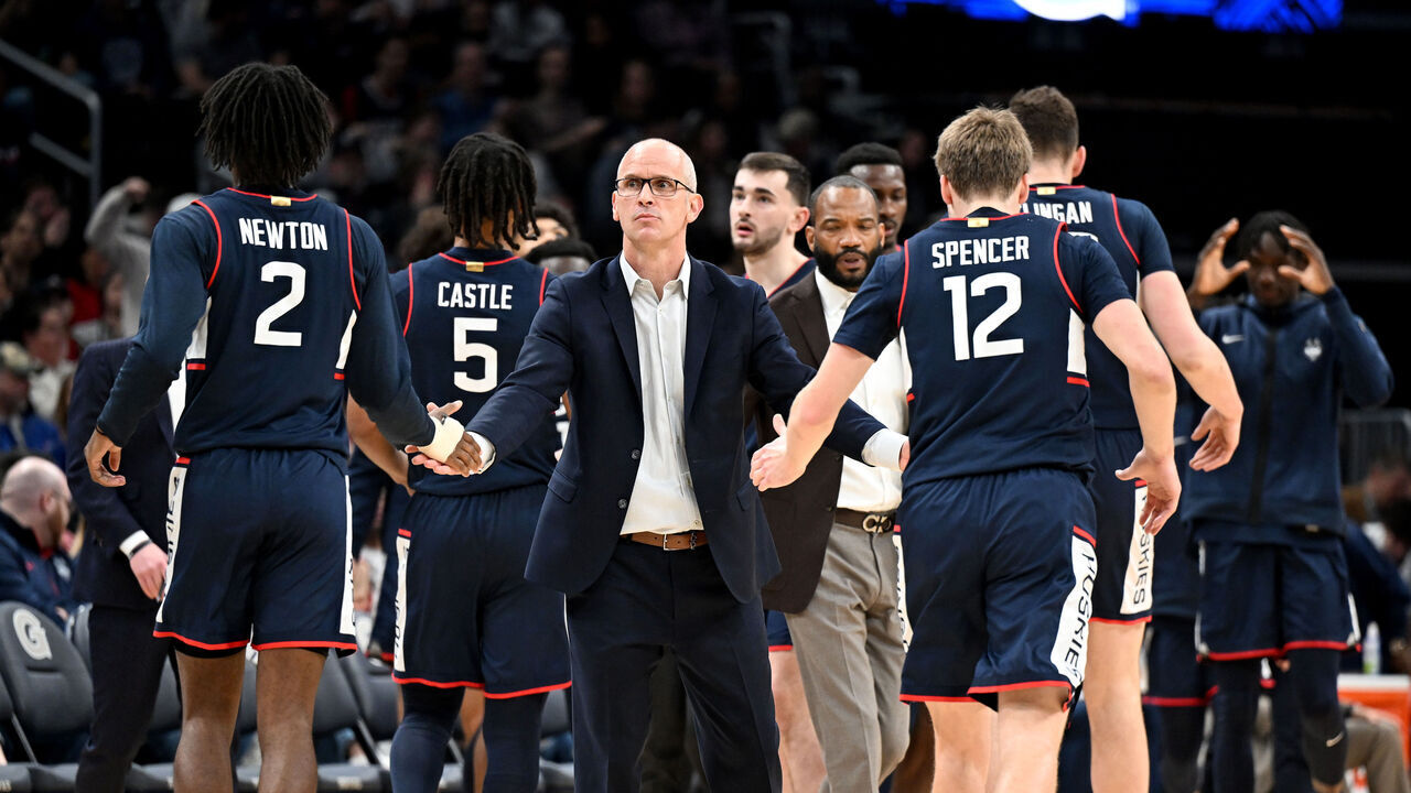 WASHINGTON, DC - FEBRUARY 10: Head coach Dan Hurley of the Connecticut Huskies celebrates with his players during the game against the Georgetown Hoyas at Capital One Arena on February 10, 2024 in Washington, DC.