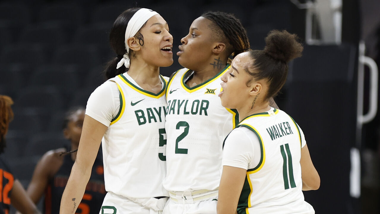 SAN ANTONIO, TX - DECEMBER 16: YaYa Felder #2 of the Baylor Bears celebrates her basket with teammates Darianna Littlepage-Buggs #5 and Jada Walker #11 in the first half of the 2023 Hall of Fame Series San Antonio against the Miami Hurricanes at Frost Bank Center on December 16, 2023 in San Antonio, Texas.
