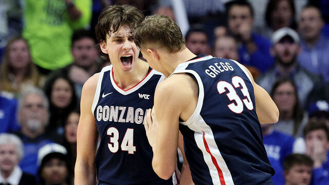 LEXINGTON, KENTUCKY - FEBRUARY 10: Braden Huff #34 of the Gonzaga Bulldogs celebrates with Ben Gregg #33 during the 89-85 win against the Kentucky Wildcats at Rupp Arena on February 10, 2024 in Lexington, Kentucky.