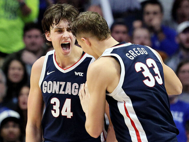 LEXINGTON, KENTUCKY - FEBRUARY 10: Braden Huff #34 of the Gonzaga Bulldogs celebrates with Ben Gregg #33 during the 89-85 win against the Kentucky Wildcats at Rupp Arena on February 10, 2024 in Lexington, Kentucky.