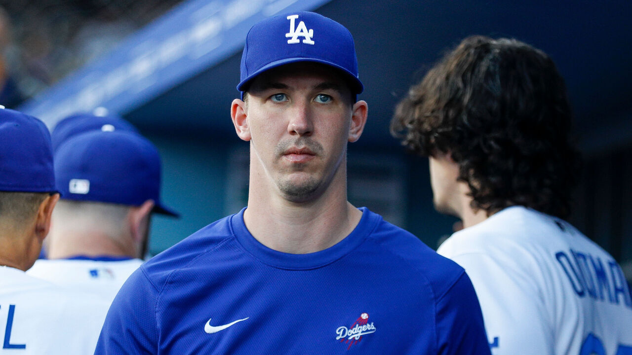 LOS ANGELES, CA - MAY 16: Los Angeles Dodgers pitcher Walker Buehler (21) walks in the dugout prior to a regular season game between the Minnesota Twins and Los Angeles Dodgers on May 16, 2023 at Dodger Stadium in Los Angeles, CA.
