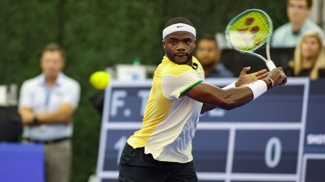 DALLAS, TX - FEBRUARY 09: Frances Tiafoe (USA) hits a backhand during the Dallas Open on February 9, 2024 at Styslinger/Altec Tennis Complex in Dallas, TX.
