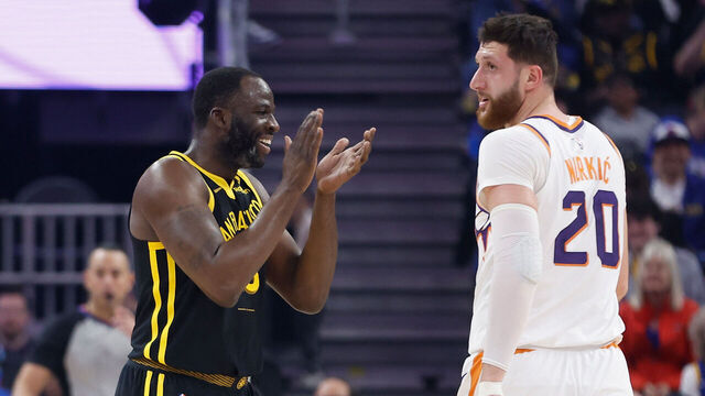 SAN FRANCISCO, CALIFORNIA - FEBRUARY 10: Draymond Green #23 of the Golden State Warriors reacts after being fouled by Jusuf Nurkic #20 of the Phoenix Suns in the first quarter at Chase Center on February 10, 2024 in San Francisco, California.