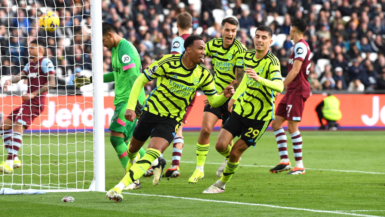 LONDON, ENGLAND - FEBRUARY 11: Gabriel of Arsenal celebrates scoring his team's third goal during the Premier League match between West Ham United and Arsenal FC at London Stadium on February 11, 2024 in London, England.