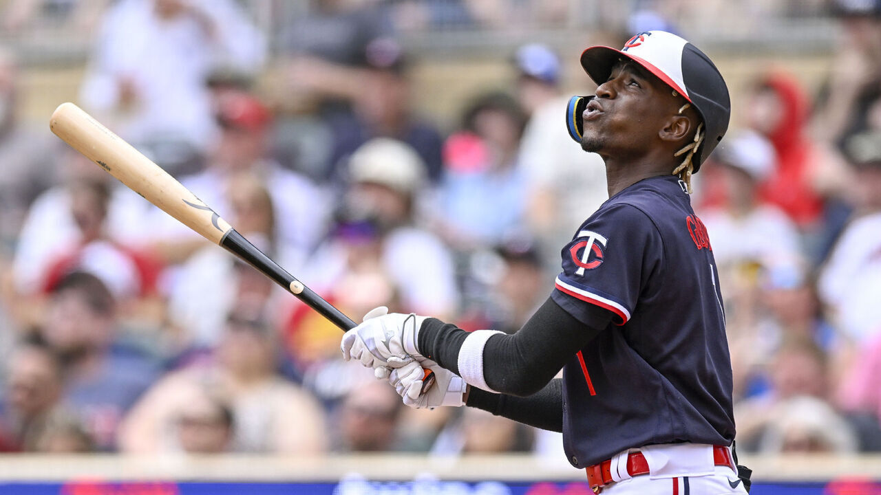 MINNEAPOLIS, MN - MAY 11: Minnesota Twins Outfield Nick Gordon (1) tracks the ball he just hit during a MLB game between the Minnesota Twins and San Diego Padres on May 11, 2023, at Target Field in Minneapolis, MN.