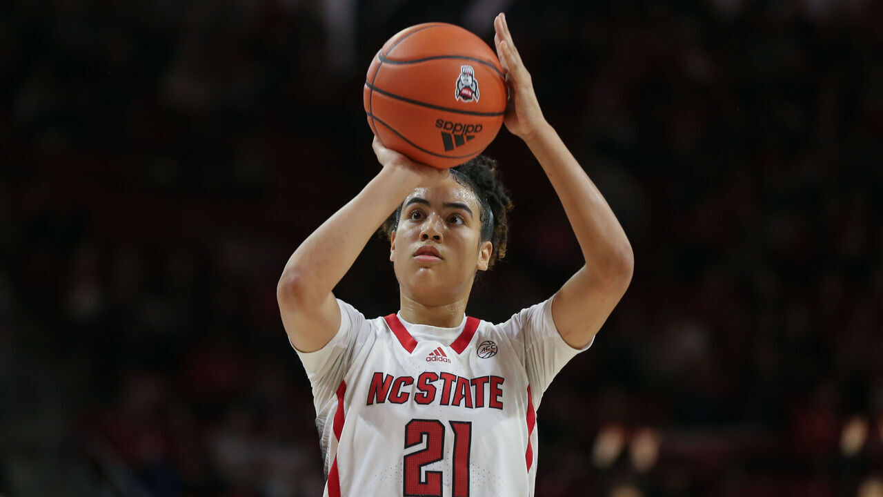 RALEIGH, NC - FEBRUARY 08: NC State Wolfpack guard Madison Hayes (21) shoots a free throw during the college basketball game between the NC State Wolfpack and the Virginia Tech Hokies on February 8, 2024 at Reynolds Coliseum in Raleigh, NC.