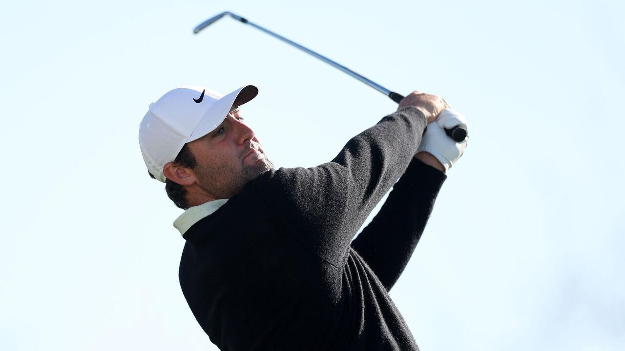 SCOTTSDALE, ARIZONA - FEBRUARY 11: Scottie Scheffler of the United States plays his shot from the 12th tee during the continuation of the third round of the WM Phoenix Open at TPC Scottsdale on February 11, 2024 in Scottsdale, Arizona.