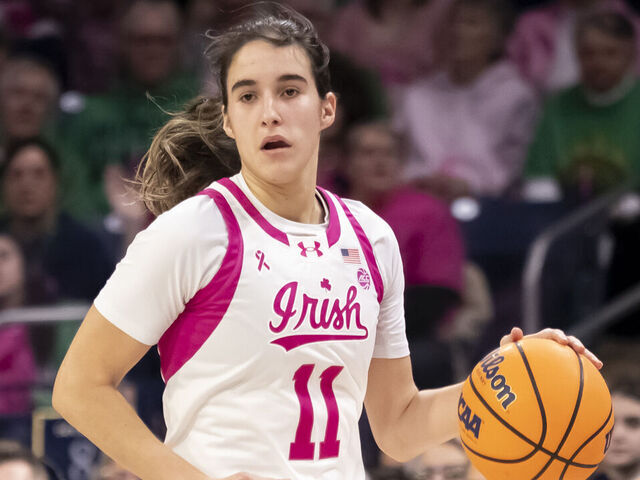 SOUTH BEND, IN - FEBRUARY 04: Notre Dame Fighting Irish guard Sonia Citron (11) dribbles the ball down court during a college basketball game between the Pittsburgh Panthers and the Notre Dame Fighting Irish on February 4, 2024 at Purcell Pavilion in South Bend, Indiana.