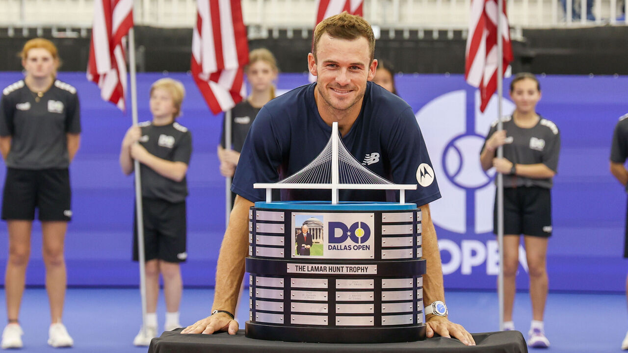 DALLAS, TX - FEBRUARY 11: Tommy Paul (USA) poses with the trophy after winning the Dallas Open on February 11, 2024 at Styslinger/Altec Tennis Complex in Dallas, TX.