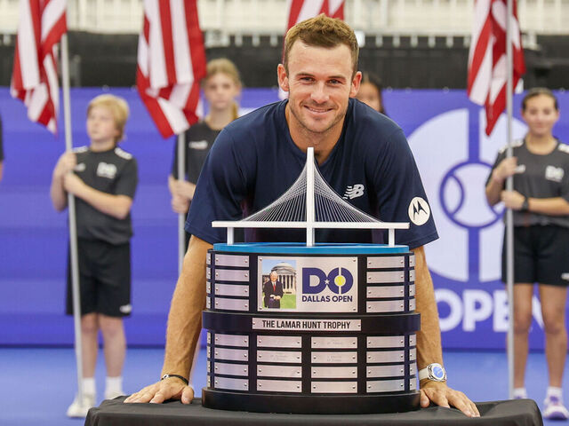 DALLAS, TX - FEBRUARY 11: Tommy Paul (USA) poses with the trophy after winning the Dallas Open on February 11, 2024 at Styslinger/Altec Tennis Complex in Dallas, TX.