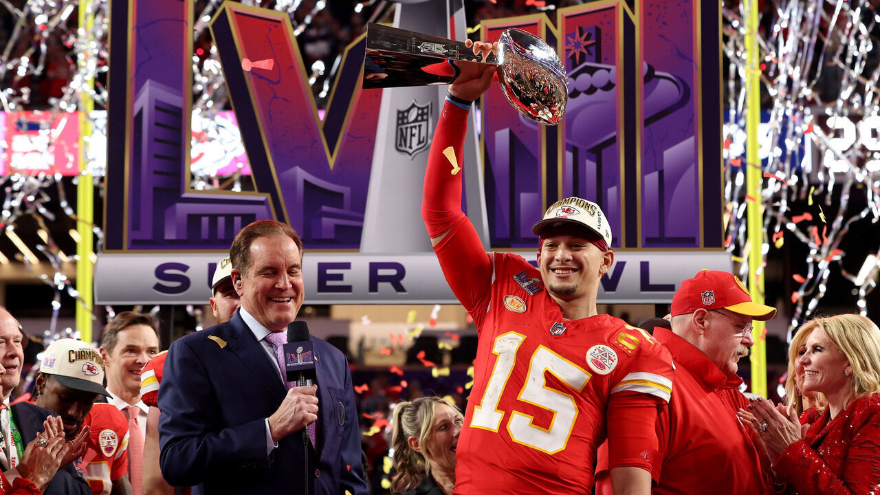 LAS VEGAS, NEVADA - FEBRUARY 11: Patrick Mahomes #15 of the Kansas City Chiefs holds the Lombardi Trophy after defeating the San Francisco 49ers 25-22 during Super Bowl LVIII at Allegiant Stadium on February 11, 2024 in Las Vegas, Nevada.