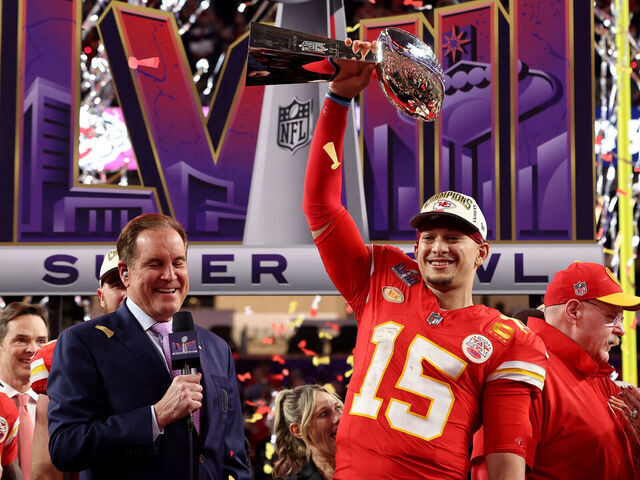 LAS VEGAS, NEVADA - FEBRUARY 11: Patrick Mahomes #15 of the Kansas City Chiefs holds the Lombardi Trophy after defeating the San Francisco 49ers 25-22 during Super Bowl LVIII at Allegiant Stadium on February 11, 2024 in Las Vegas, Nevada.