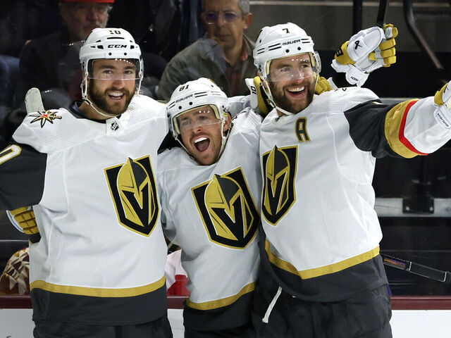 TEMPE, ARIZONA - FEBRUARY 08: Jonathan Marchessault #81 of the Vegas Golden Knights celebrates with Nicolas Roy #10, and Alex Pietrangelo #7 after he scored a goal against the Arizona Coyotes during the first period at Mullett Arena on February 08, 2024 in Tempe, Arizona.