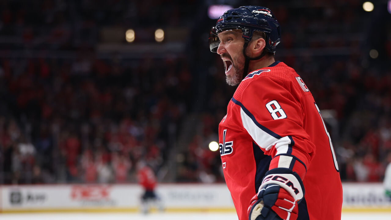 WASHINGTON, DC - FEBRUARY 11: Alex Ovechkin #8 of the Washington Capitals celebrates after scoring a goal against the Vancouver Canucks during the second period at Capital One Arena on February 11, 2024 in Washington, DC.