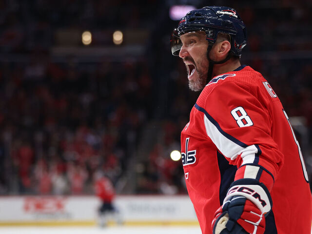WASHINGTON, DC - FEBRUARY 11: Alex Ovechkin #8 of the Washington Capitals celebrates after scoring a goal against the Vancouver Canucks during the second period at Capital One Arena on February 11, 2024 in Washington, DC.