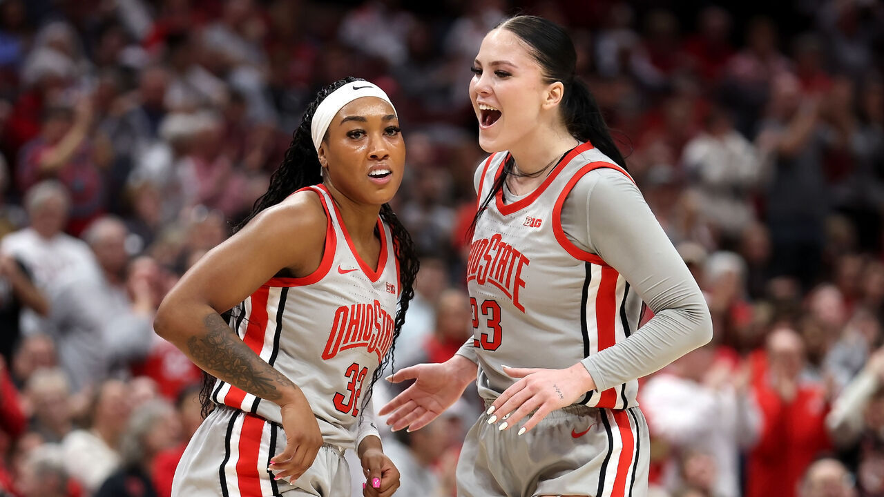 COLUMBUS, OHIO - FEBRUARY 4: Cotie McMahon #32 of the Ohio State Buckeyes is congratulated by Rebeka Mikulasikova #23 after drawing a foul during the game against the Indiana Hoosiers at Value City Arena on February 4, 2024 in Columbus, Ohio.
