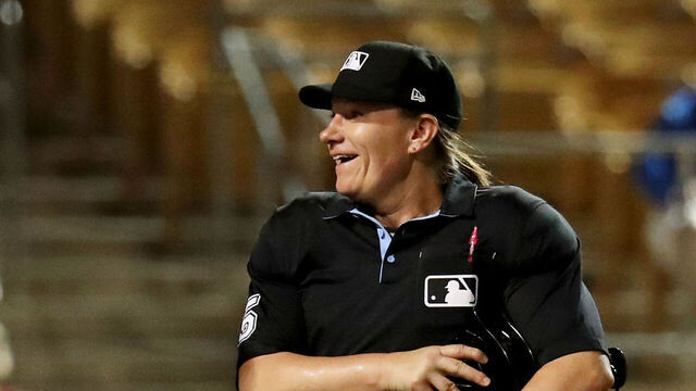 GLENDALE, AZ - OCTOBER 05: Home plate umpire Jen Pawol and Iggy Suarez (2) of the Glendale Desert Dogs talk in between innings during the game between the Scottsdale Scorpions and the Glendale Desert Dogs at Camelback Ranch on Thursday, October 5, 2023 in Glendale, Arizona.