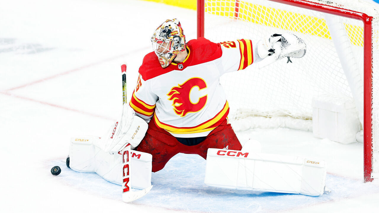 ST PAUL, MINNESOTA - JANUARY 02: Jacob Markstrom #25 of the Calgary Flames makes a save against the Minnesota Wild in the third period at Xcel Energy Center on January 02, 2024 in St Paul, Minnesota. The Flames defeated the Wild 3-1.