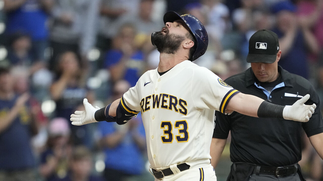 MILWAUKEE, WISCONSIN - JUNE 20: Jesse Winker #33 of the Milwaukee Brewers celebrates after hitting a two-run home run against the Arizona Diamondbacks in the fourth inning at American Family Field on June 20, 2023 in Milwaukee, Wisconsin.
