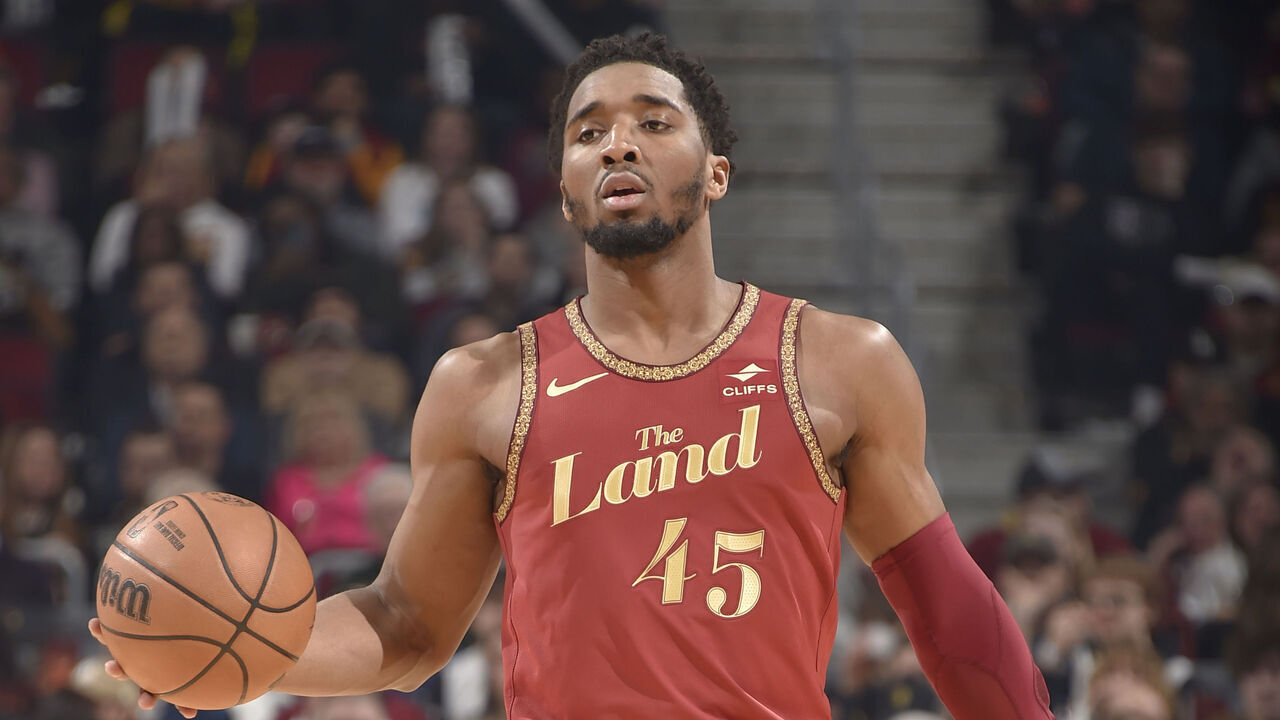 CLEVELAND, OH - FEBRUARY 12: Donovan Mitchell #45 of the Cleveland Cavaliers handles the ball during the game against the Philadelphia 76ers on February 12, 2024 at Rocket Mortgage FieldHouse in Cleveland, Ohio. NOTE TO USER: User expressly acknowledges and agrees that, by downloading and/or using this Photograph, user is consenting to the terms and conditions of the Getty Images License Agreement. Mandatory Copyright Notice: Copyright 2024 NBAE