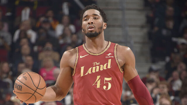 CLEVELAND, OH - FEBRUARY 12: Donovan Mitchell #45 of the Cleveland Cavaliers handles the ball during the game against the Philadelphia 76ers on February 12, 2024 at Rocket Mortgage FieldHouse in Cleveland, Ohio. NOTE TO USER: User expressly acknowledges and agrees that, by downloading and/or using this Photograph, user is consenting to the terms and conditions of the Getty Images License Agreement. Mandatory Copyright Notice: Copyright 2024 NBAE