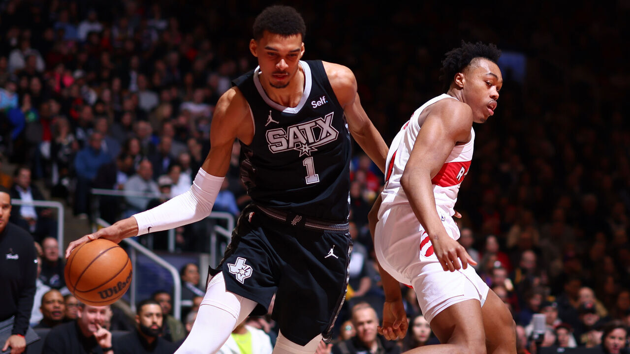 TORONTO, CANADA - FEBRUARY 12: Victor Wembanyama #1 of the San Antonio Spurs handles the ball during the game against the Toronto Raptors on February 12, 2024 at the Scotiabank Arena in Toronto, Ontario, Canada. Mandatory Copyright Notice: Copyright 2023 NBAE