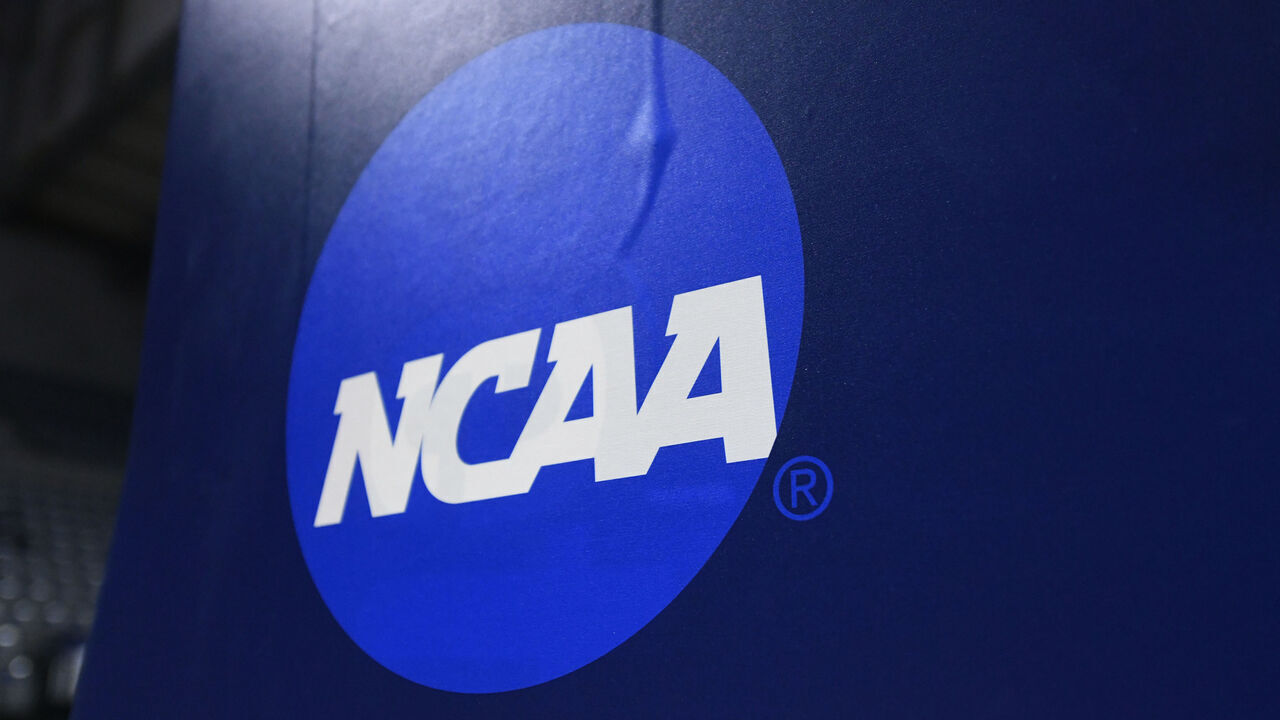 FORT WAYNE, IN - MARCH 19: A NCAA logo is displayed on the goal post before the Division III National Championship basketball game between the Randolph-Macon Yellow Jackets and the Elmhurst Bluejays on March 19, 2022, at the Allen County War Memorial Coliseum in Fort Wayne, Indiana.