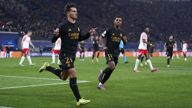LEIPZIG, GERMANY - FEBRUARY 13: Brahim Diaz of Real Madrid CF celebrates after scoring his team's first goal during the UEFA Champions League 2023/24 round of 16 first leg match between RB Leipzig and Real Madrid CF at Red Bull Arena on February 13, 2024 in Leipzig, Germany.