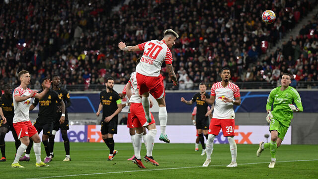 13 February 2024, Saxony, Leipzig: Soccer, Champions League, RB Leipzig - Real Madrid, knockout round, round of 16, first leg, at the Red Bull Arena. Leipzig's Benjamin Sesko (M) scores a goal which is disallowed for offside. Photo: Robert Michael/dpa