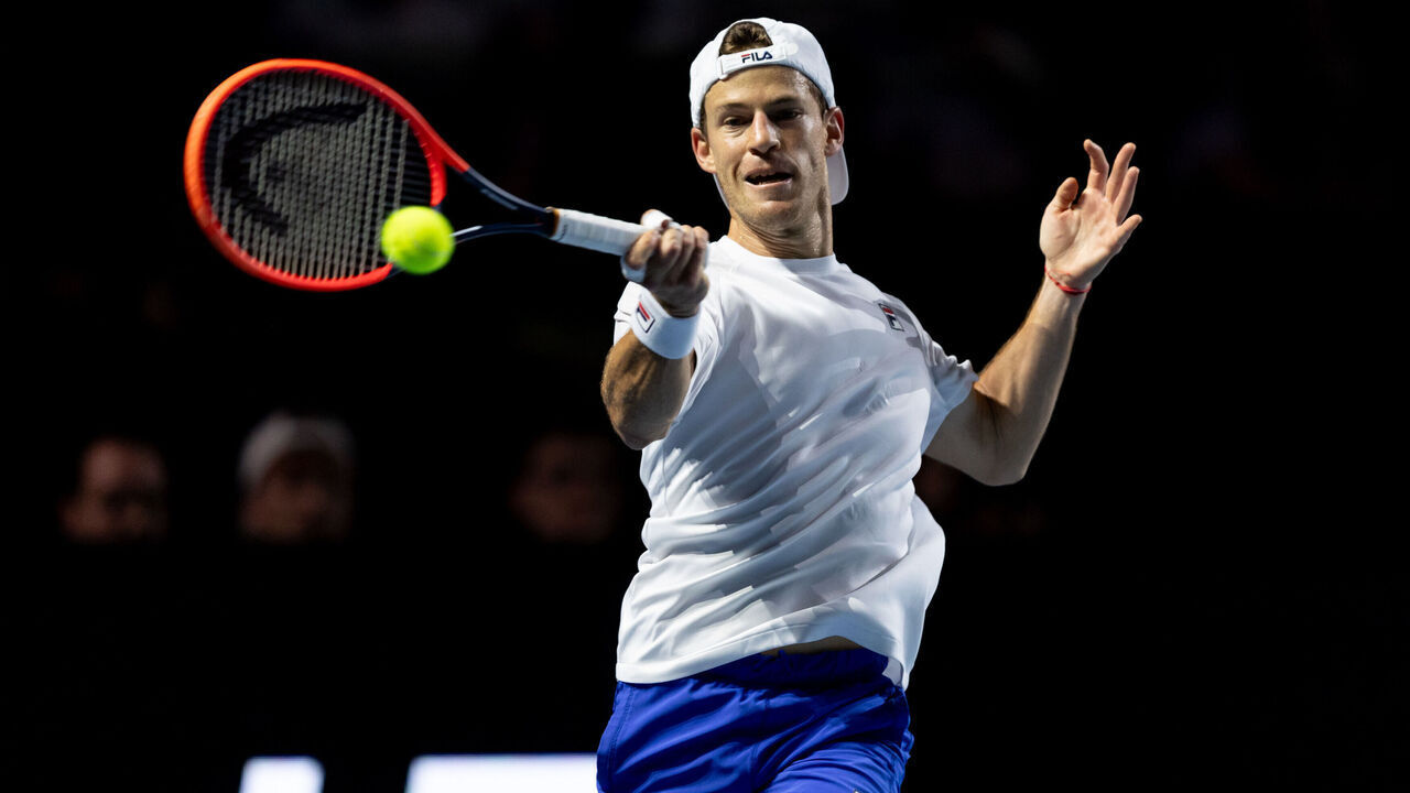 LONDON, ENGLAND - DECEMBER 16: Diego Schwartzman of Argentina plays a forehand shot against Casper Ruud of Norway during their Group A match of the UTS 2023 Grand Final on December 16, 2023 at the ExCel in London, England.