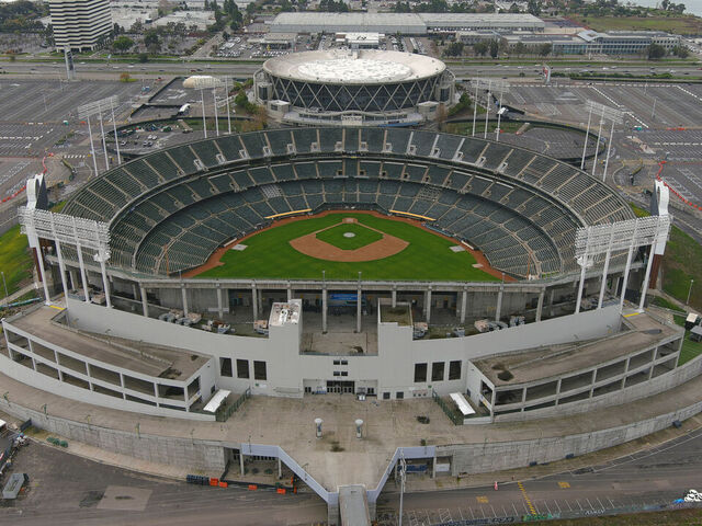 OAKLAND, CALIFORNIA - DECEMBER 31: A general overall aerial view of the Oakland-Alameda County Coliseum (bottom) and Oakland Arena on December 31, 2023 in Oakland, California.