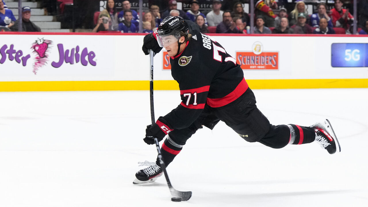 OTTAWA, CANADA - FEBRUARY 10: Ridly Greig #71 of the Ottawa Senators scores an empty net goal against the Toronto Maple Leafs during the third period at Canadian Tire Centre on February 10, 2024 in Ottawa, Ontario, Canada.