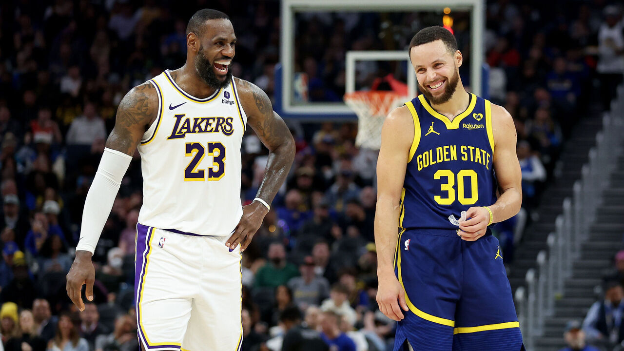 SAN FRANCISCO, CALIFORNIA - JANUARY 27: Stephen Curry #30 of the Golden State Warriors and LeBron James #23 of the Los Angeles Lakers joke around with one another during their game at Chase Center on January 27, 2024 in San Francisco, California.