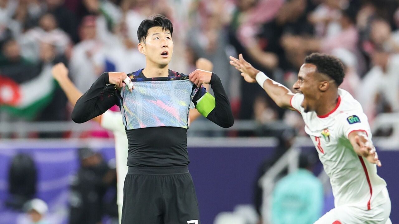South Korea's Son Heung Min L and Jordan's Abdallah Nasib react after the semi-final between Jordan and South Korea at AFC Asian Cup Qatar 2023 in Al Rayyan, Qatar, Feb. 6, 2024.