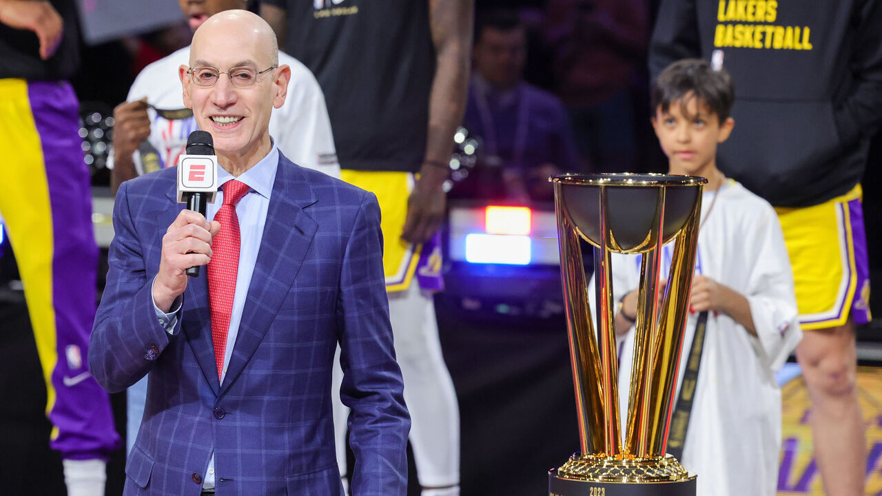 LAS VEGAS, NEVADA - DECEMBER 09: NBA Commissioner Adam Silver gets ready to present the championship trophy for the inaugural NBA In-Season Tournament to the Los Angeles Lakers after they defeated the Indiana Pacers 123-109 at T-Mobile Arena on December 09, 2023 in Las Vegas, Nevada.