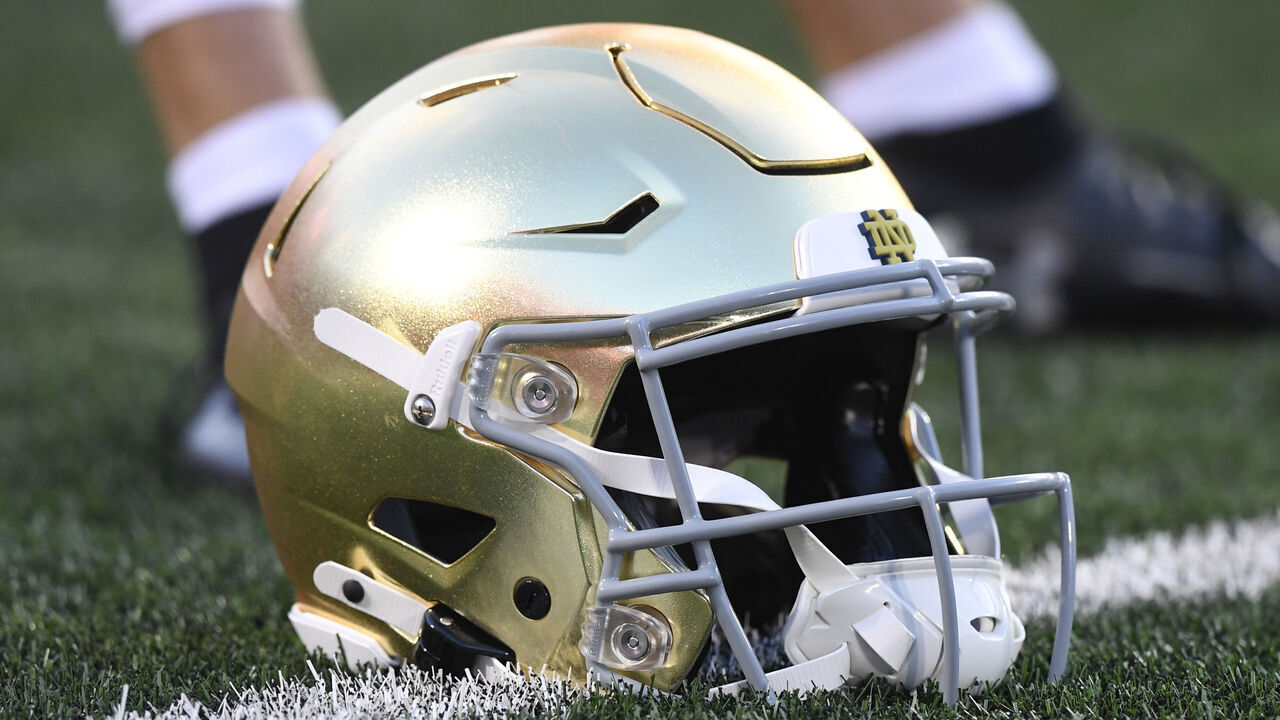 LOUISVILLE, KY - OCTOBER 07: A Notre Dame Fighting Irish helmet sits on the field before the college football game between the Notre Dame Fighting Irish and the Louisville Cardinals on October 7, 2023, at L&N Stadium Stadium in Louisville, Kentucky.