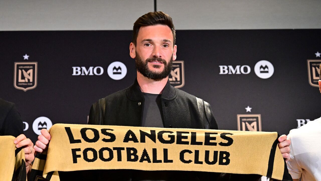 French goalkeeper Hugo Lloris poses with a Los Angeles FC scarf at a press conference after signing with LAFC in Los Angeles, California, on February 14, 2024. Major League Soccer's Los Angeles FC completed the signing of French World Cup winning goalkeeper Hugo Lloris after he terminated his contract with Tottenham Hotspur on December 30, 2023. The 37-year-old was France's first-choice 'keeper when they won the 2018 World Cup by beating Croatia in the final and also played in the epic 2022 final which the French lost to Argentina on penalties.