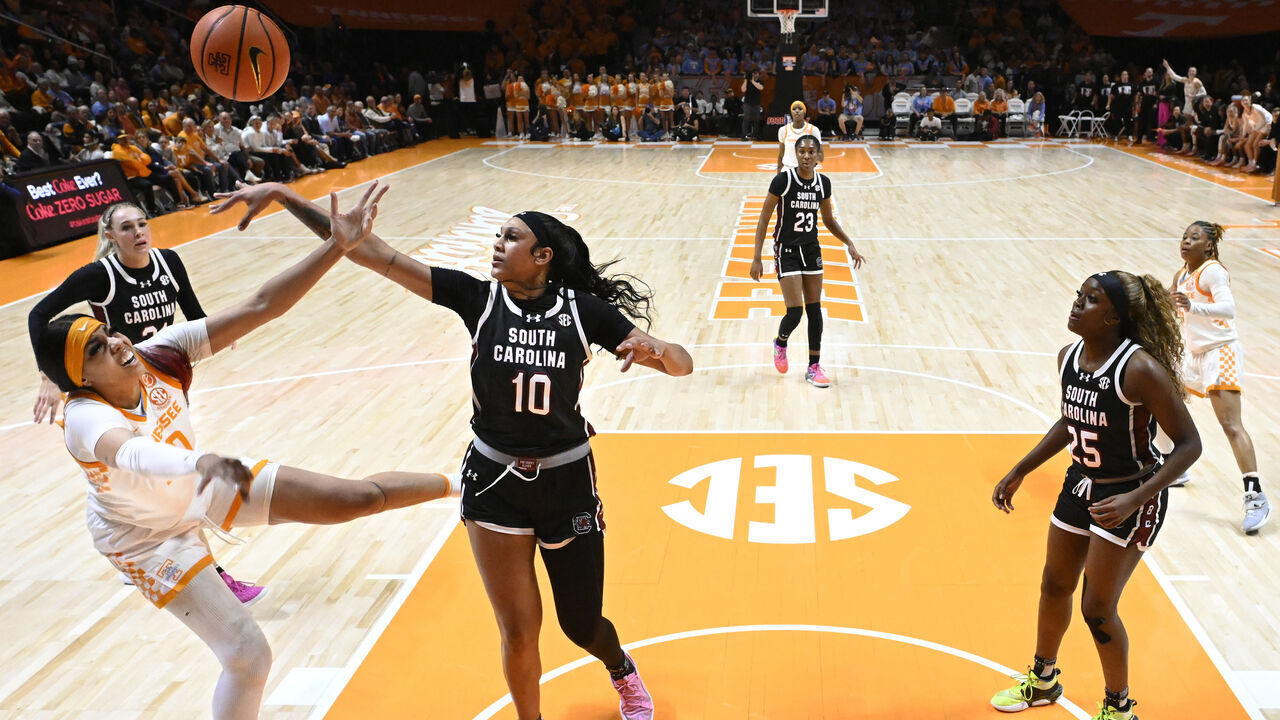KNOXVILLE, TENNESSEE - FEBRUARY 15: Kamilla Cardoso #10 of the South Carolina Gamecocks blocks a layup attempt by Tamari Key #20 of the Tennessee Lady Vols in the first quarter at Thompson-Boling Arena on February 15, 2024 in Knoxville, Tennessee.