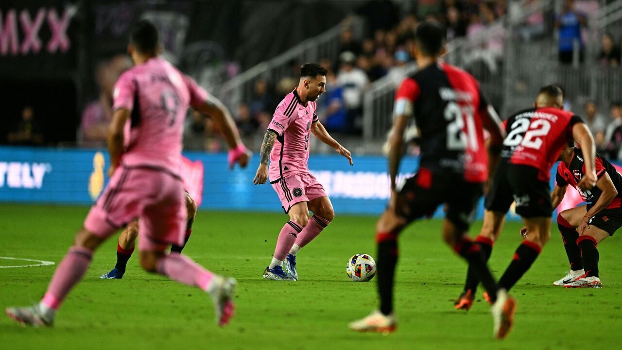 Inter Miami's Argentine forward #10 Lionel Messi vie for the ball during the friendly football match between Inter Miami CF vs. Newell's Old Boys at DRV PNK Stadium in Fort Lauderdale, Florida, on February 15, 2024. Inter Miami superstar Lionel Messi returned to the starting lineup for the MLS club on Thursday in a 1-1 home draw with his Argentine boyhood club, Newell's Old Boys.